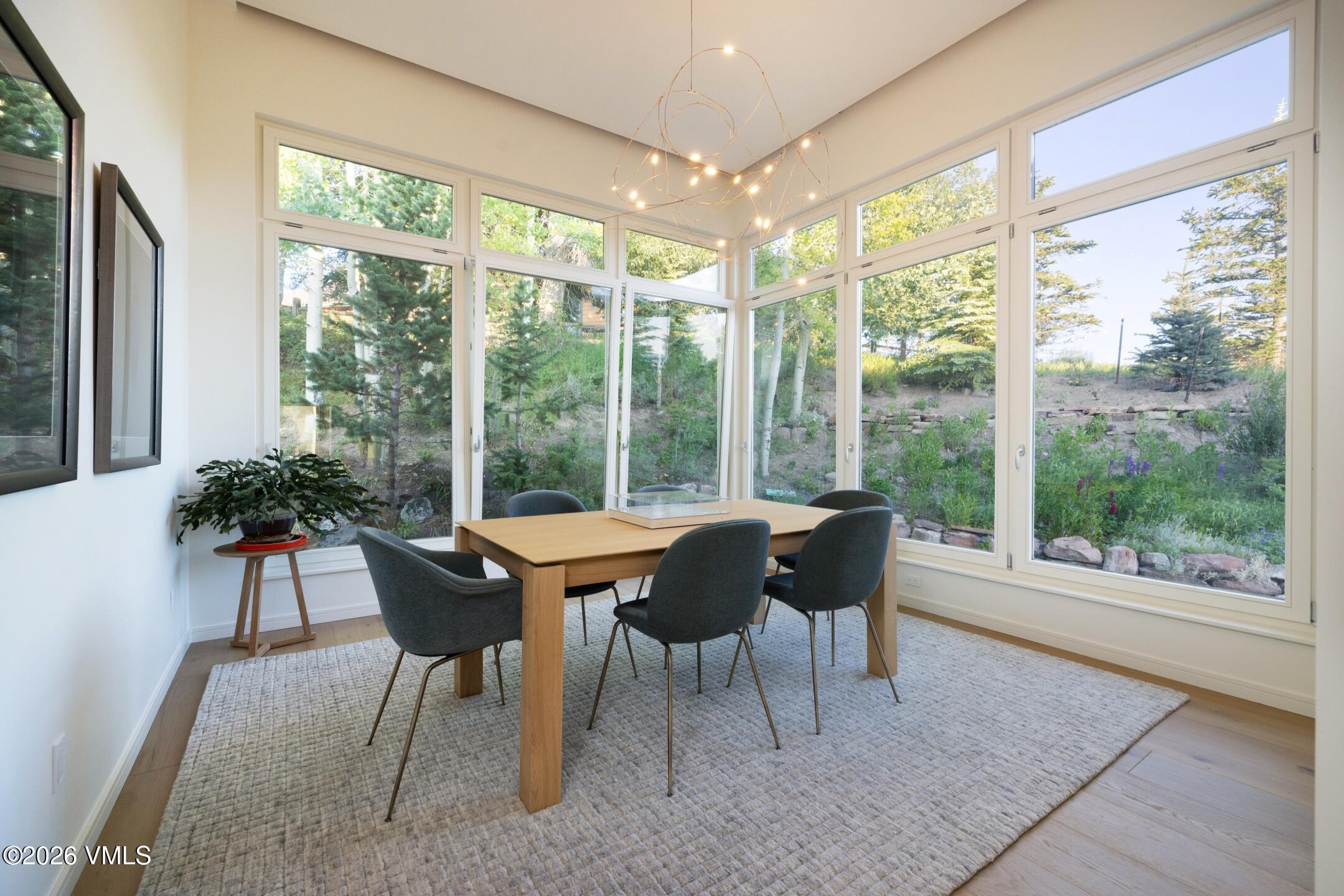 4340 June Point Avon, CO 81620 - Photo 11 of 43 a dining room with furniture and windows