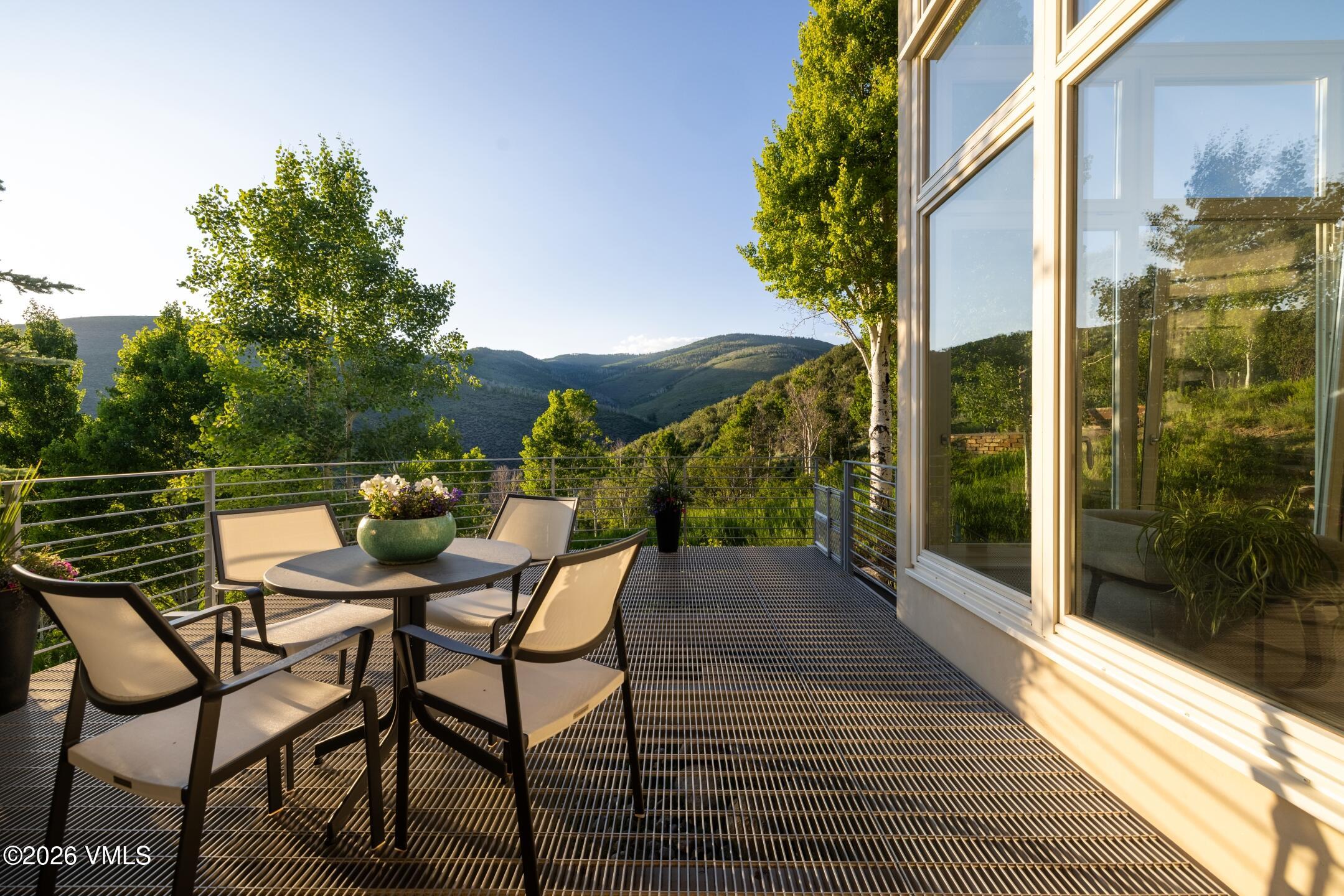 4340 June Point Avon, CO 81620 - Photo 12 of 43 a view of a balcony with furniture