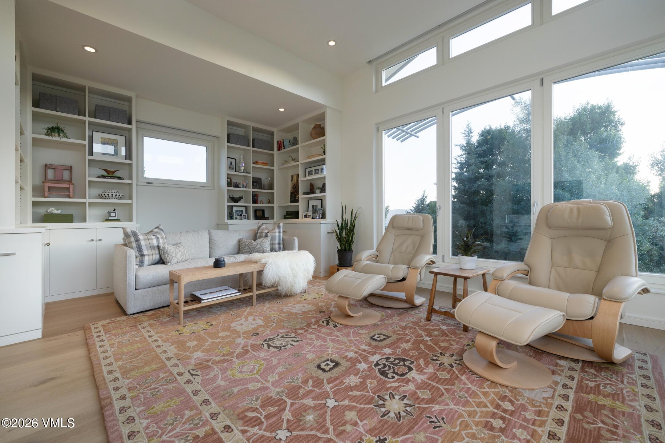 4340 June Point Avon, CO 81620 - Photo 18 of 43 a living room with furniture and a large window