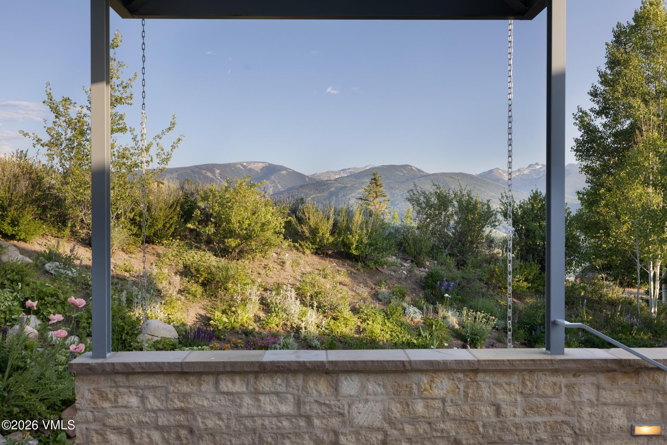 4340 June Point Avon, CO 81620 - Photo 33 of 43 a view of a yard with wooden fence