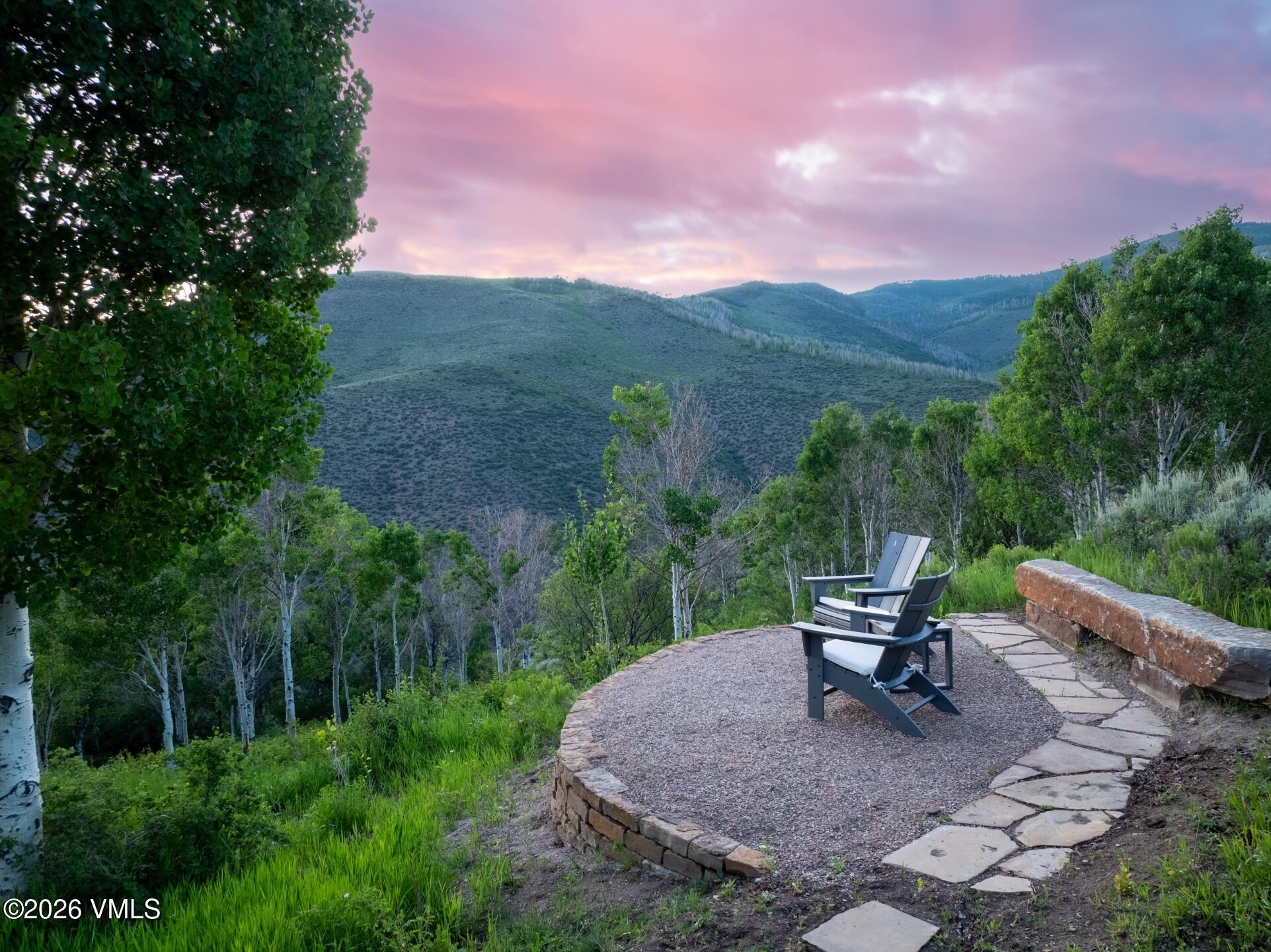 4340 June Point Avon, CO 81620 - Photo 34 of 43 a view of a backyard with sitting area