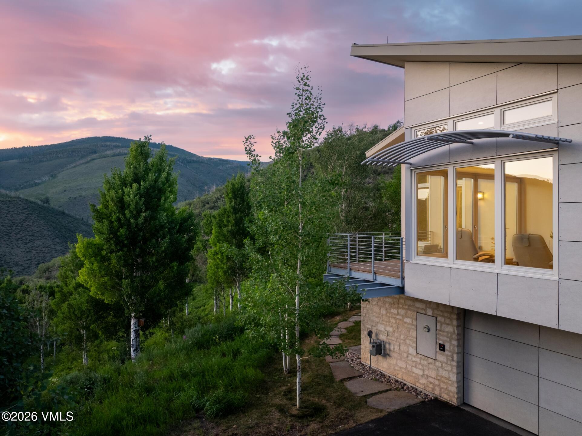 4340 June Point Avon, CO 81620 - Photo 37 of 43 a view of a house with a yard