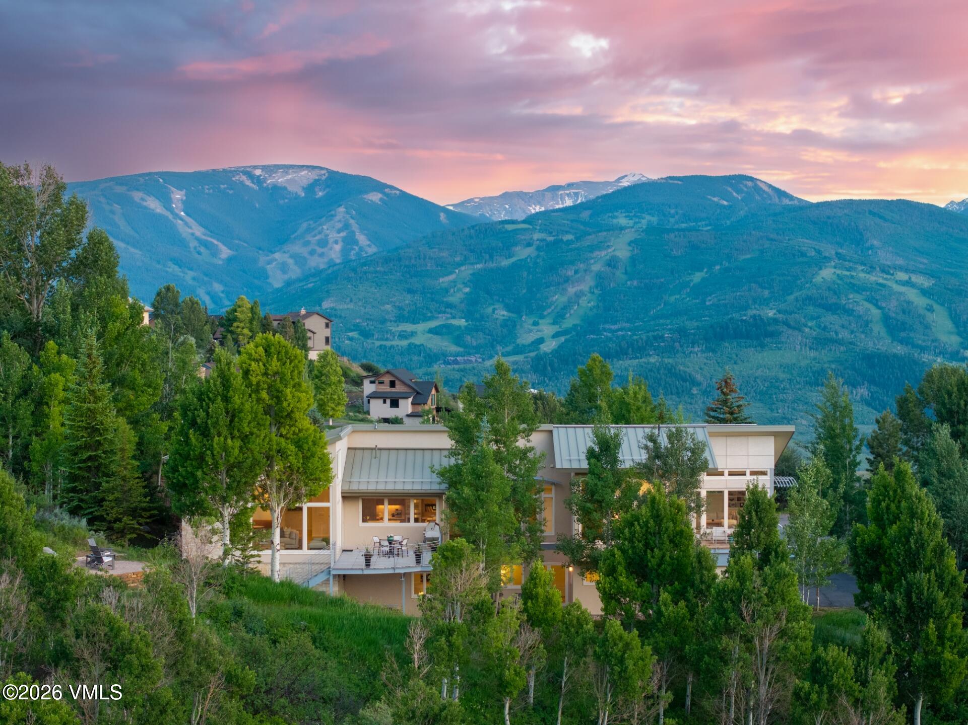 4340 June Point Avon, CO 81620 - Photo 39 of 43 a view of a house with a yard and a street view