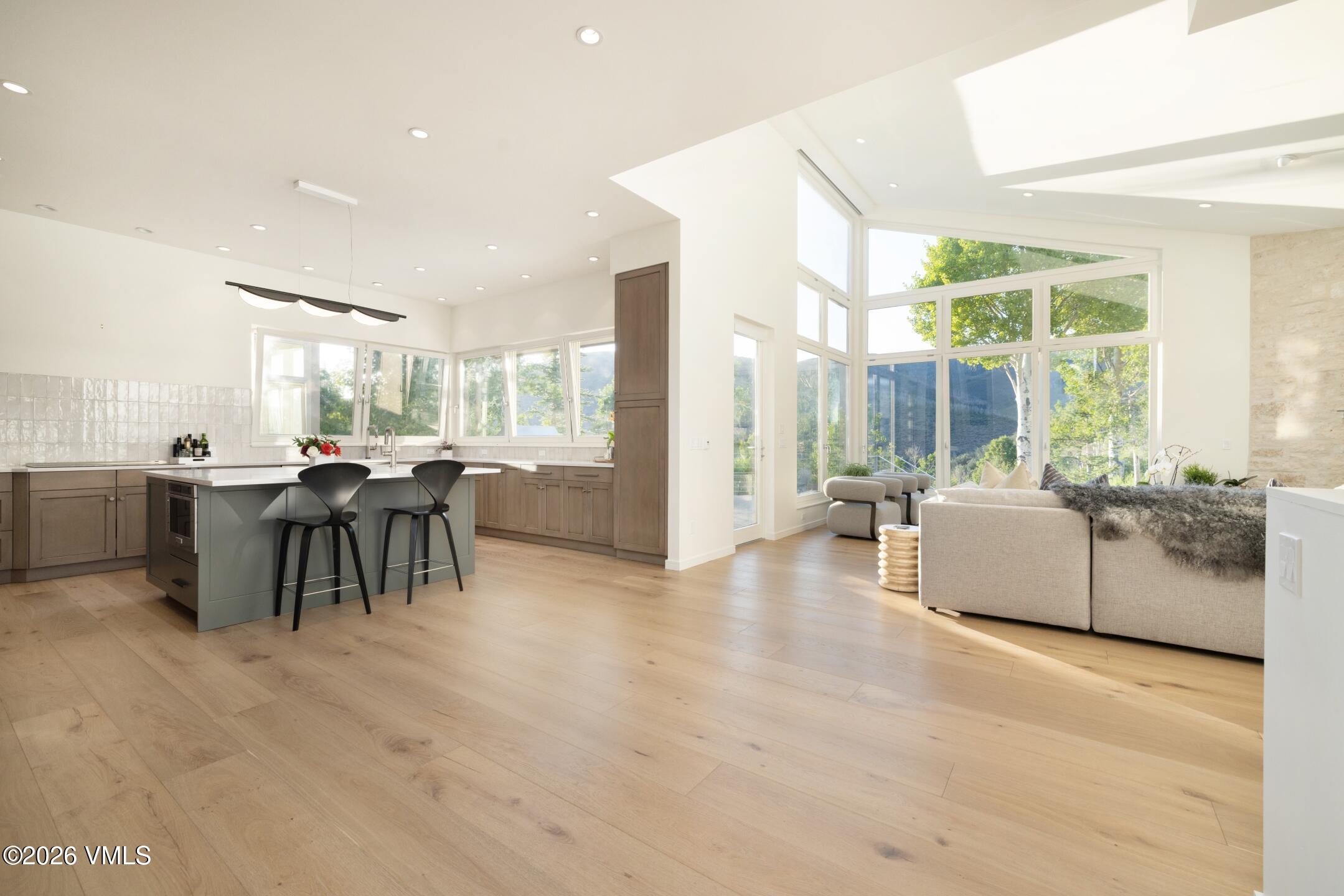 4340 June Point Avon, CO 81620 - Photo 6 of 43 a living room with furniture and a large window