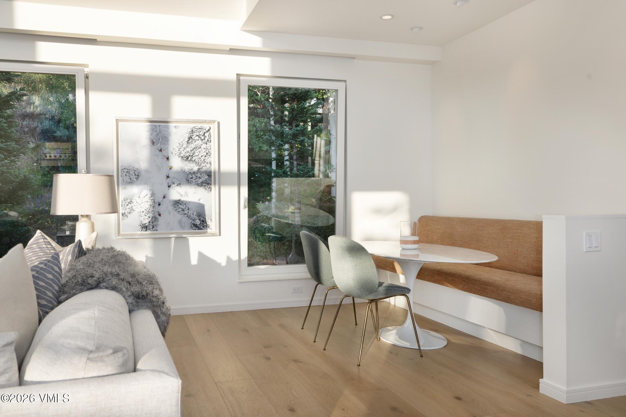 4340 June Point Avon, CO 81620 - Photo 9 of 43 a living room with furniture and a lamp