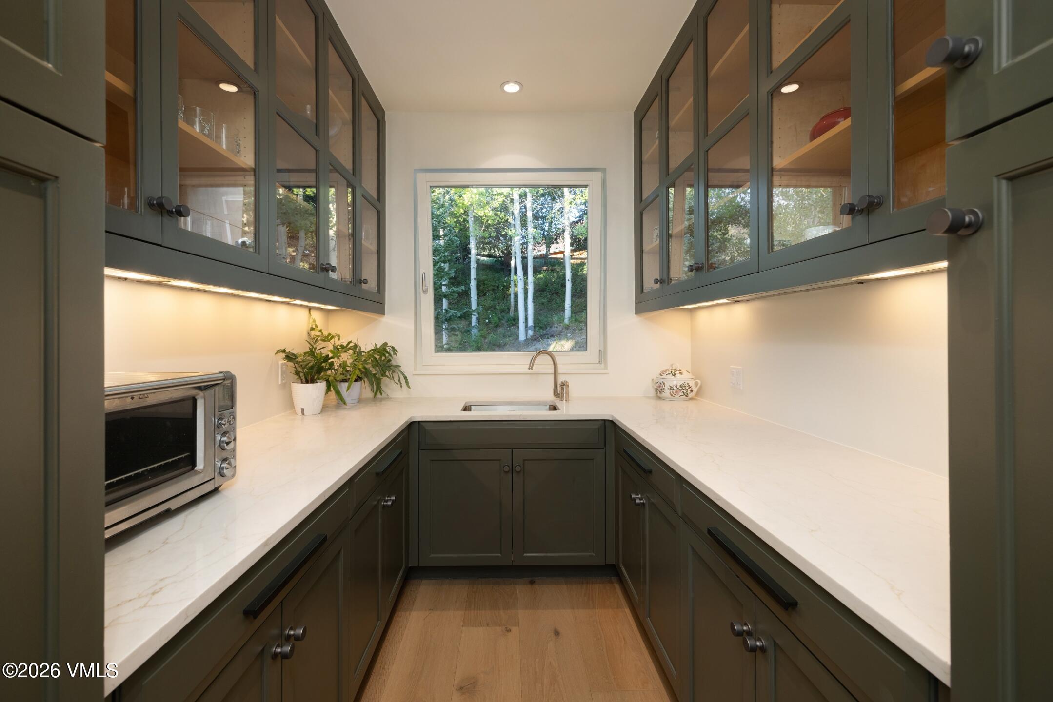 4340 June Point Avon, CO 81620 - Photo 10 of 43 a kitchen with a sink and a window