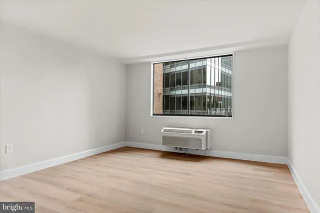 a kitchen with stainless steel appliances a refrigerator sink and cabinets