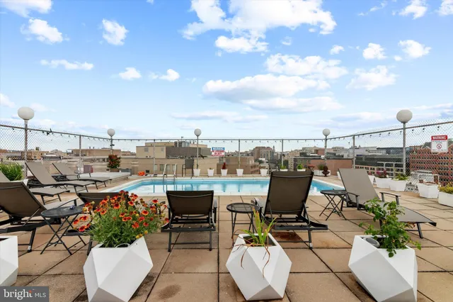 a view of a terrace with furniture and potted plants
