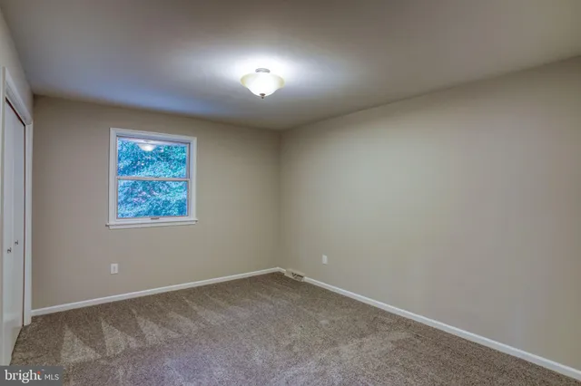 a bathroom with a sink toilet and vanity