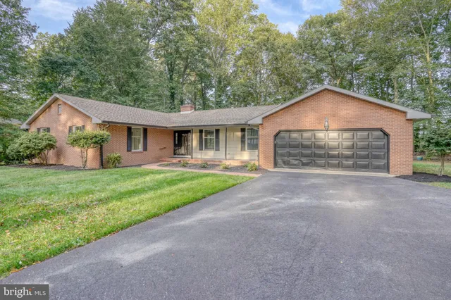 a aerial view of a house with garden