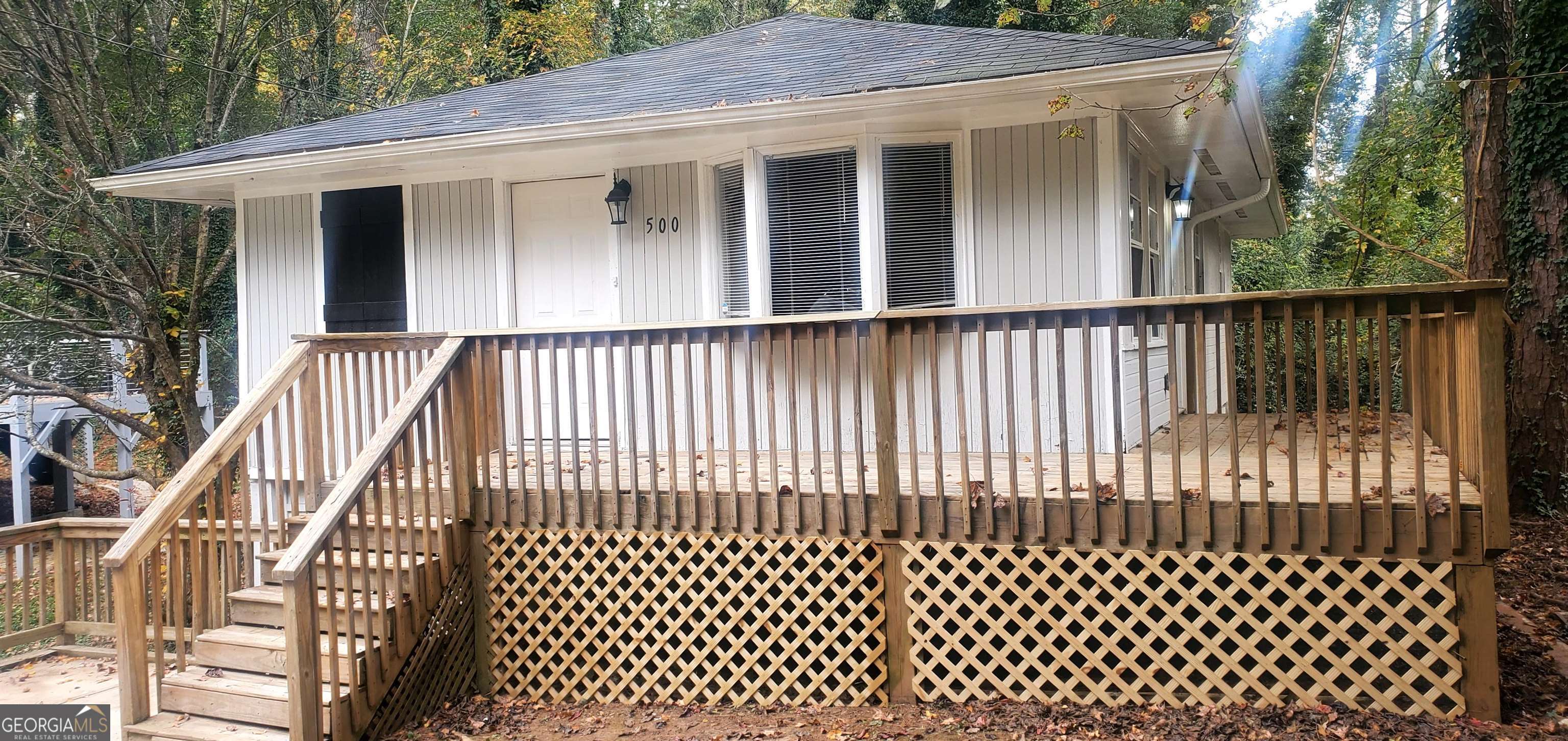 500 Wilson Mill Road Southwest Atlanta, GA 30331 - Photo 1 of 1 a view of a house with a wooden deck