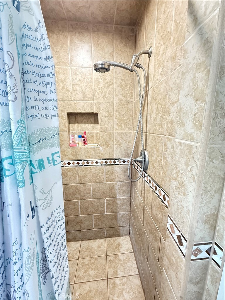 1014 North Daisy Avenue Santa Ana, CA 92703 - Photo 15 of 27 a bathroom with a shower