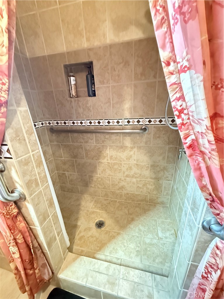 1014 North Daisy Avenue Santa Ana, CA 92703 - Photo 22 of 27 a bath tub sitting next to a shower