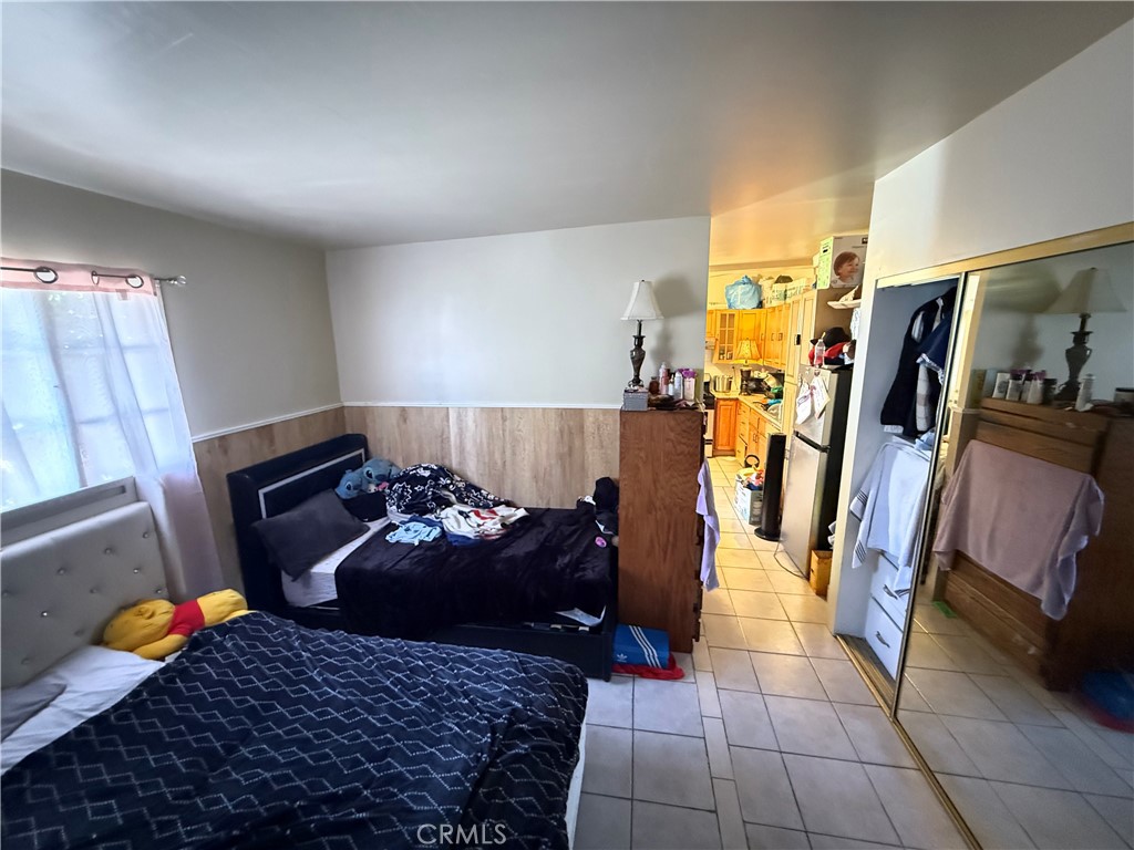 1014 North Daisy Avenue Santa Ana, CA 92703 - Photo 26 of 27 a bedroom with furniture and a rug