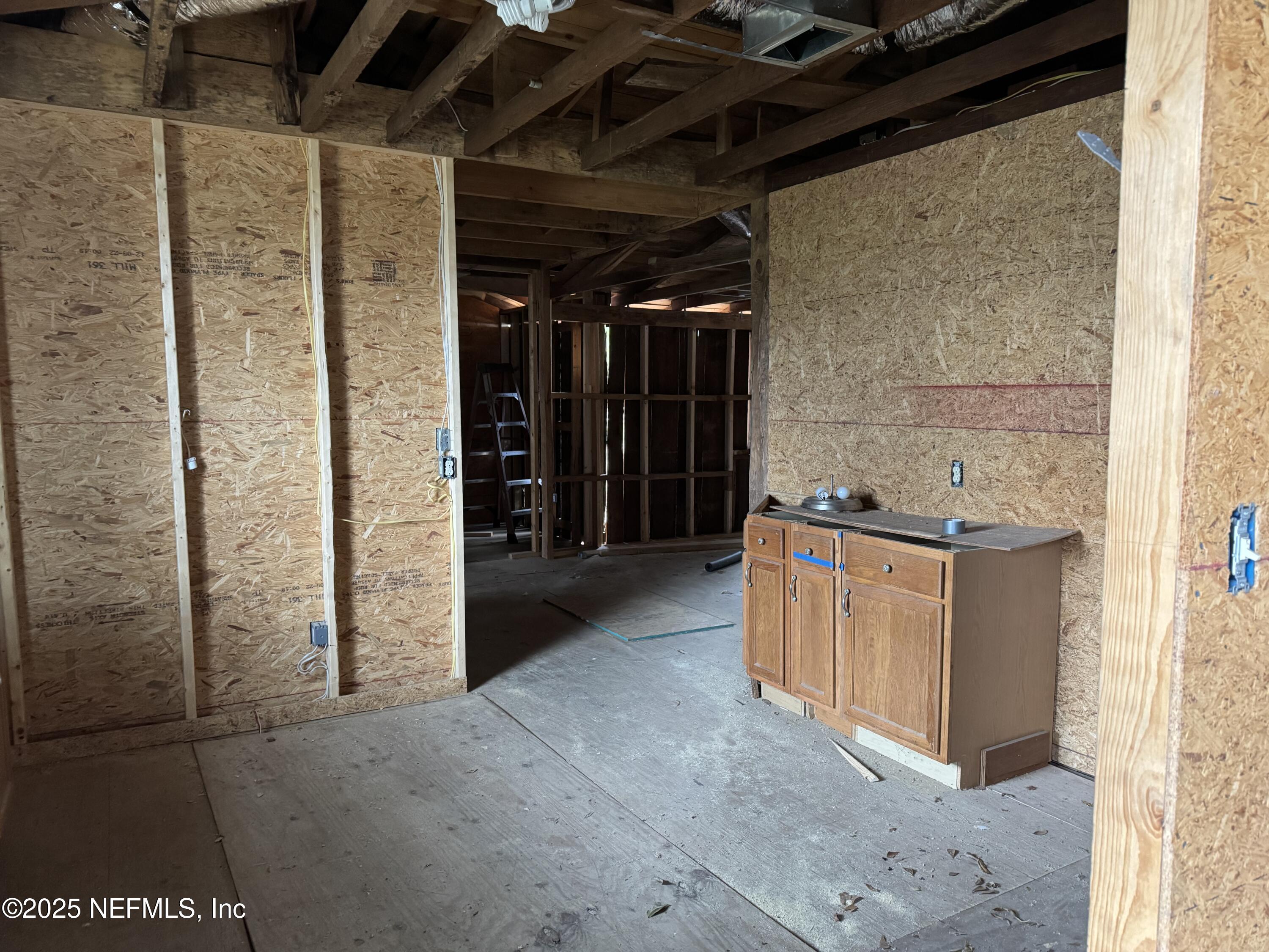 312 South Church Street Starke, FL 32091 - Photo 6 of 18 a view of storage and utility room