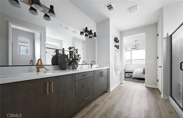 a large room with a lot of white cabinets