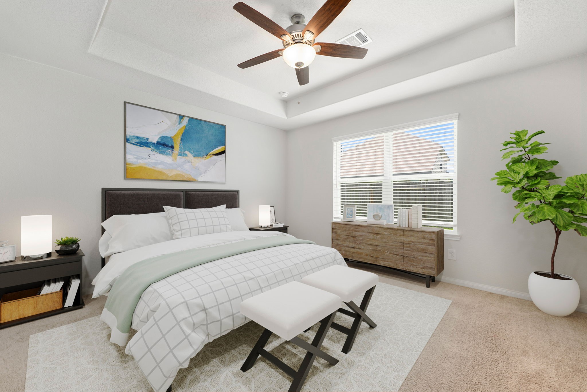 17555 Greystanes Road Humble, TX 77346 - Photo 10 of 28 a bedroom with a bed and a potted plant