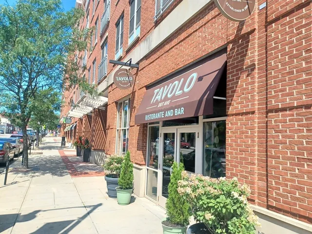 a view of a car park in front of a building