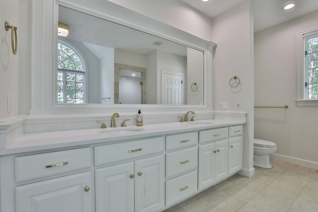 5 Stanton Circle Boxford, MA 01921 - Photo 24 of 42 a bathroom with double sink and a toilet