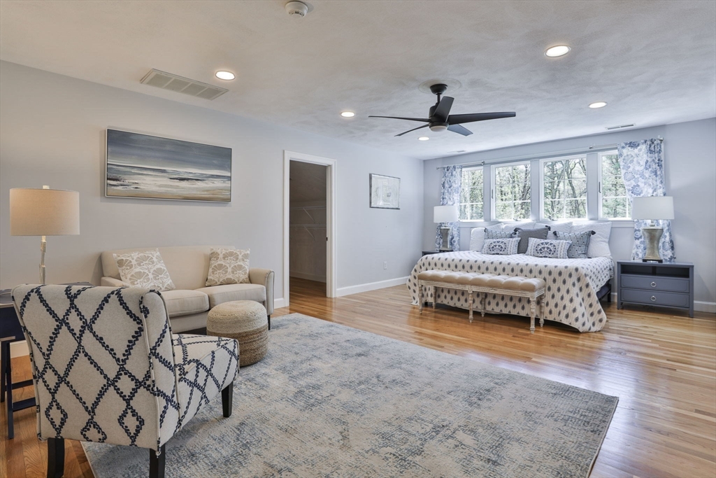 5 Stanton Circle Boxford, MA 01921 - Photo 30 of 42 a bedroom with a bed and ceiling fan
