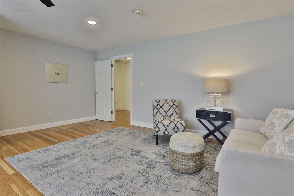 5 Stanton Circle Boxford, MA 01921 - Photo 32 of 42 a living room with furniture and a rug