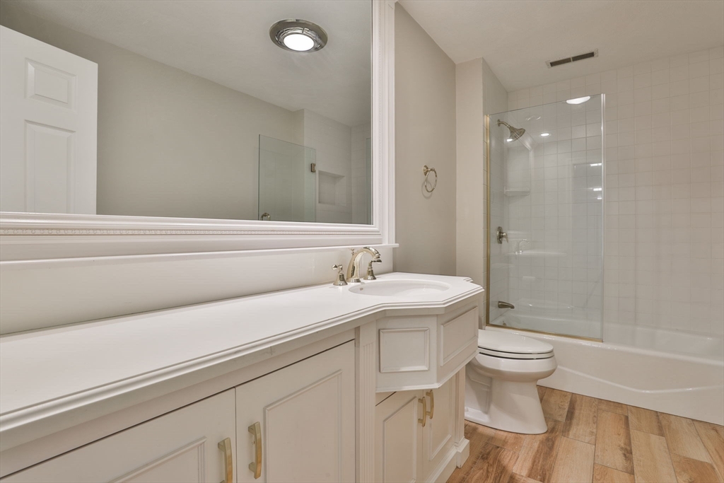 5 Stanton Circle Boxford, MA 01921 - Photo 36 of 42 a bathroom with a sink a toilet and shower