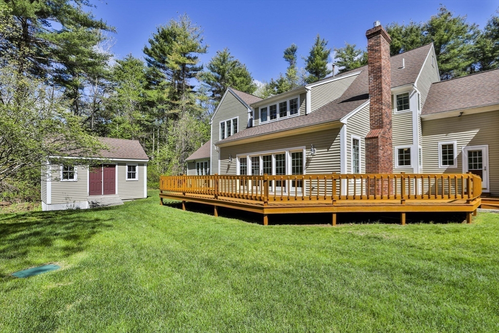 5 Stanton Circle Boxford, MA 01921 - Photo 39 of 42 a view of a house with a backyard and deck