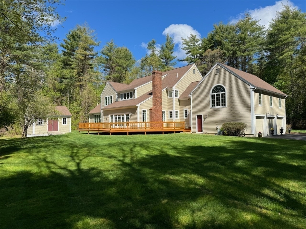 5 Stanton Circle Boxford, MA 01921 - Photo 42 of 42 a view of a house with a big yard potted plants and large tree