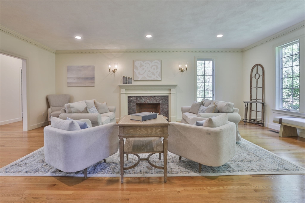 5 Stanton Circle Boxford, MA 01921 - Photo 5 of 42 a living room with furniture and a fireplace