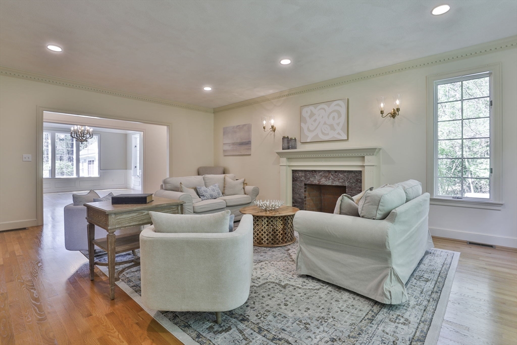 5 Stanton Circle Boxford, MA 01921 - Photo 7 of 42 a living room with furniture and a fireplace