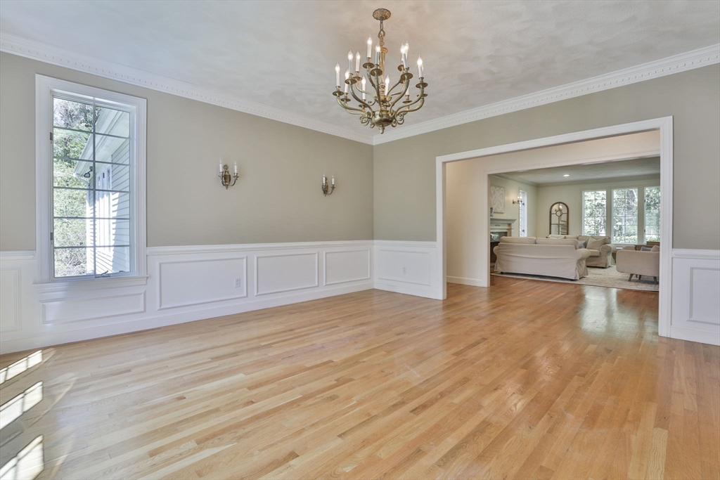 5 Stanton Circle Boxford, MA 01921 - Photo 10 of 42 wooden floor in an empty room with a window