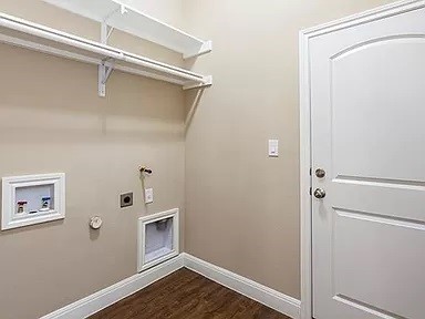 206 Sunrise Ridge Cove Austin, TX 78738 - Photo 23 of 38 a view of an empty room with wooden floor and closet