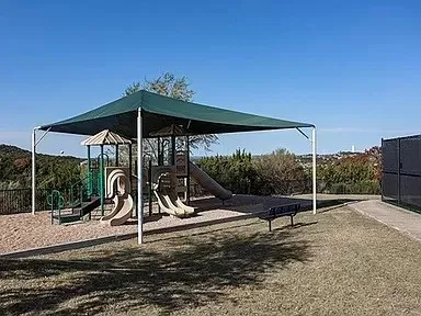 a view of a park with slide