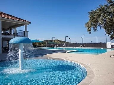 206 Sunrise Ridge Cove Austin, TX 78738 - Photo 36 of 38 a view of a backyard