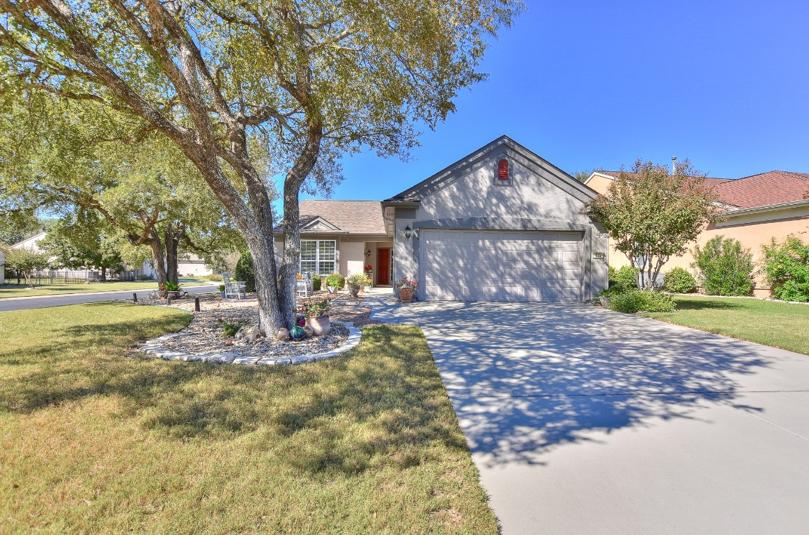 322 Yukon Terrace Georgetown, TX 78633 - Photo 1 of 1 a view of a yard in front of a house with large trees