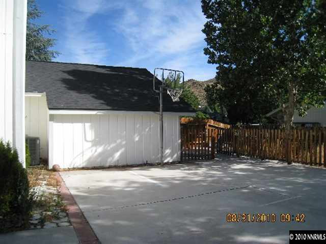 10080 Raccoon Court Reno, NV 89523 - Photo 6 of 8 a view of a outdoor space with brick wall