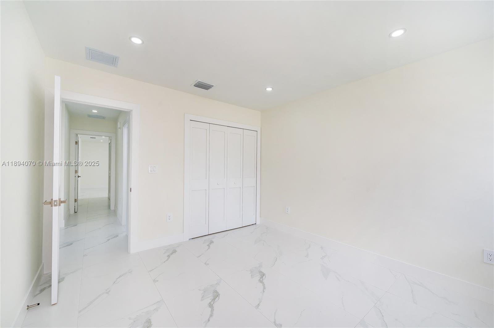 975 Southwest 89th Avenue Miami, FL 33174 - Photo 9 of 17 a view of an empty room