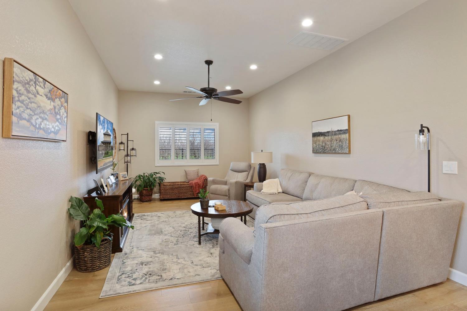 23346 Frederick Road Ripon, CA 95366 - Photo 26 of 96 a living room with furniture and a large window