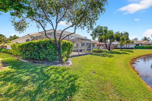 a kitchen with stainless steel appliances a refrigerator sink and stove