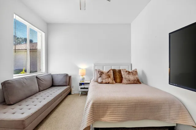 an aerial view of a house with a lake view