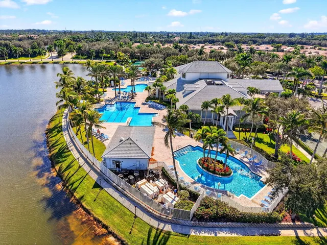 a view of a chairs and table in the patio