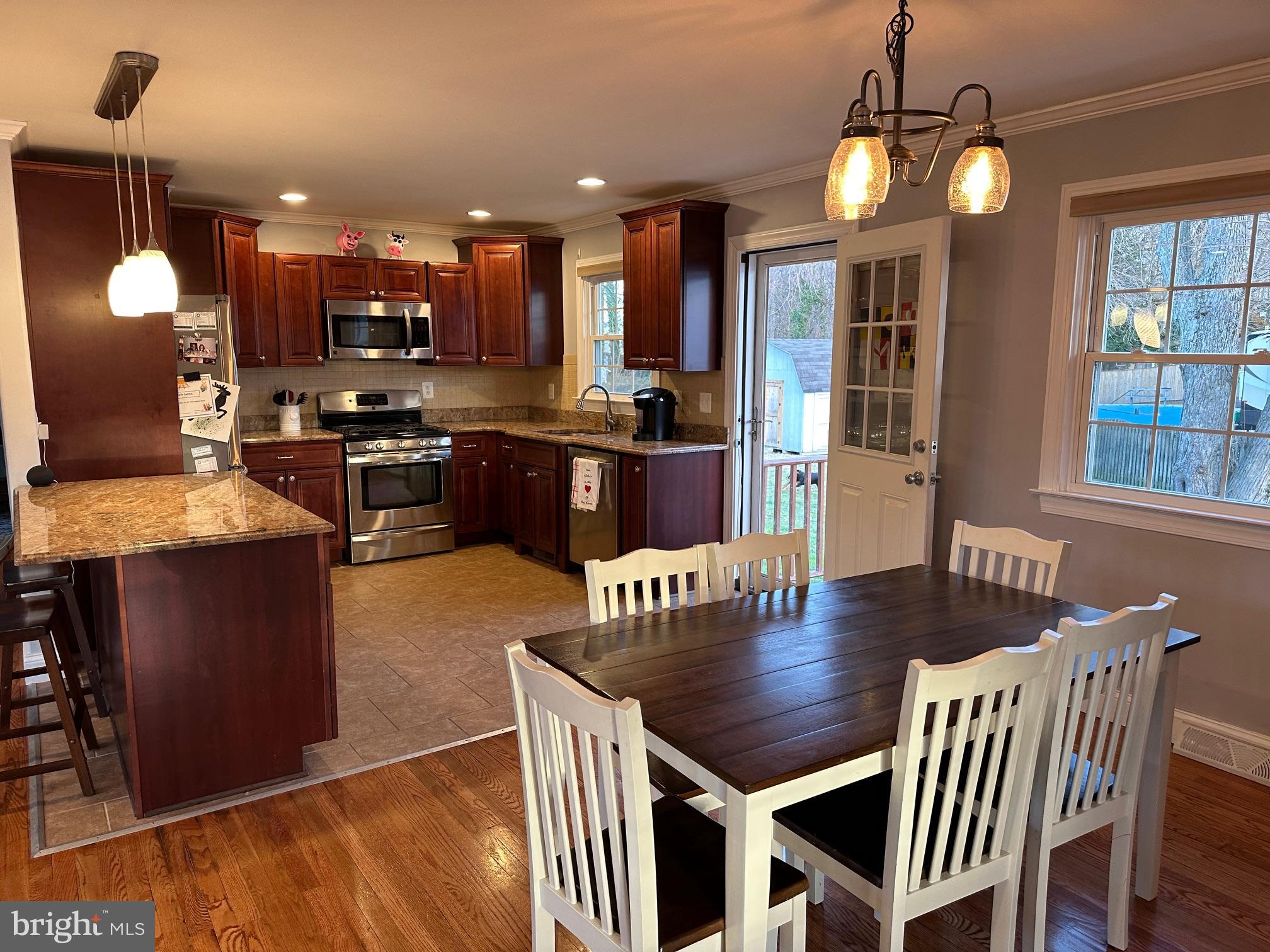 231 Inlet Drive Pasadena, MD 21122 - Photo 10 of 38 Kitchen open to dining