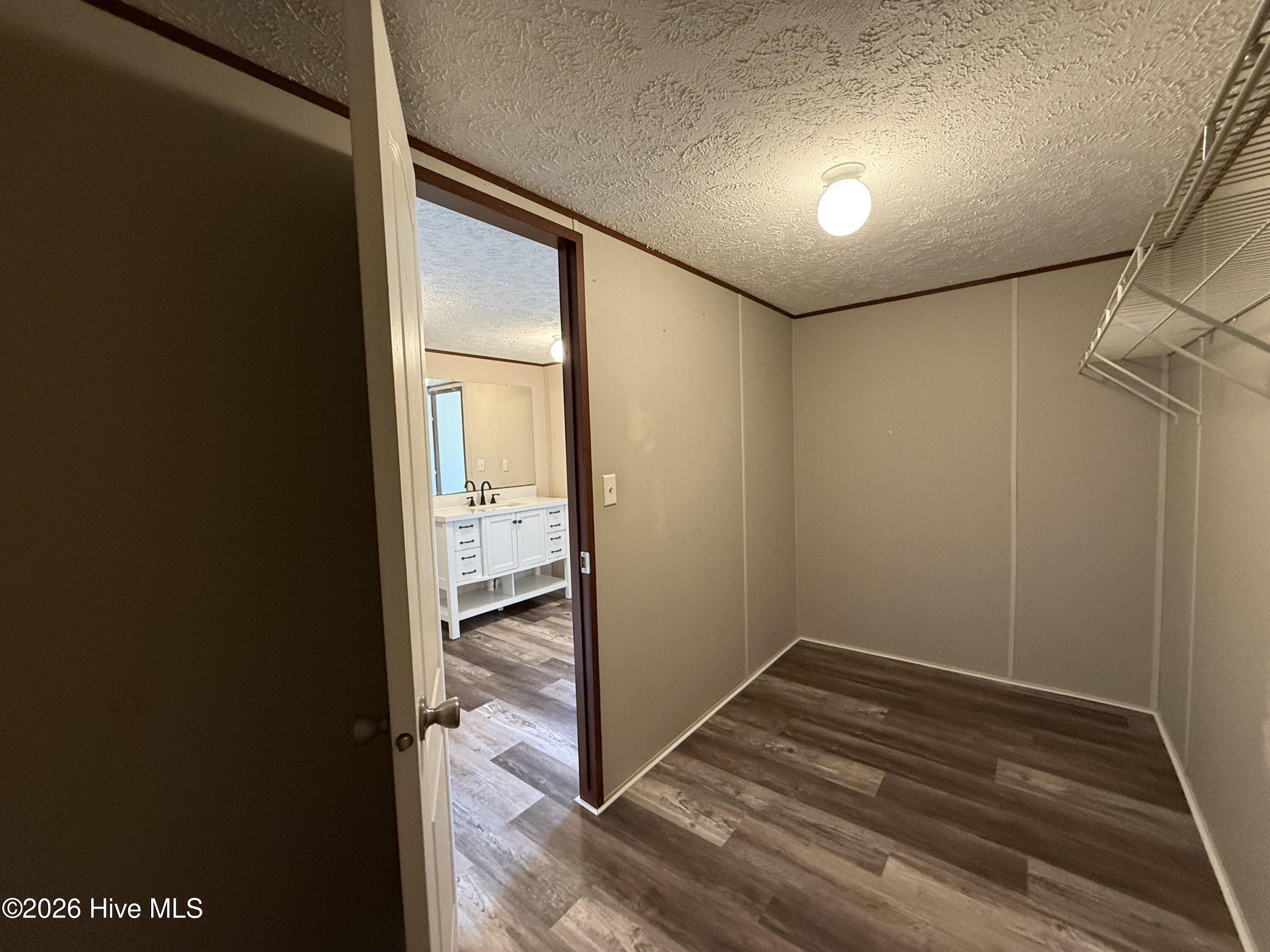 2069 Ralph Taylor Road Williamston, NC 27892 - Photo 18 of 27 Owner walk-in closet