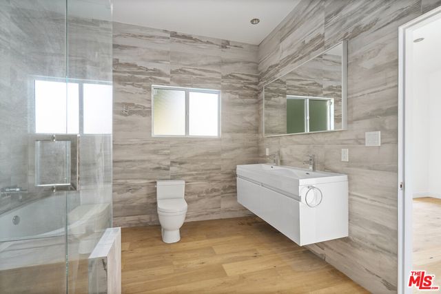 a bathroom with a sink and bathtub