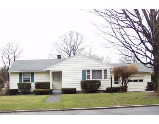 100 Embassy Road Springfield, MA 01119 - Photo 1 of 1 a front view of a house with a yard and garage