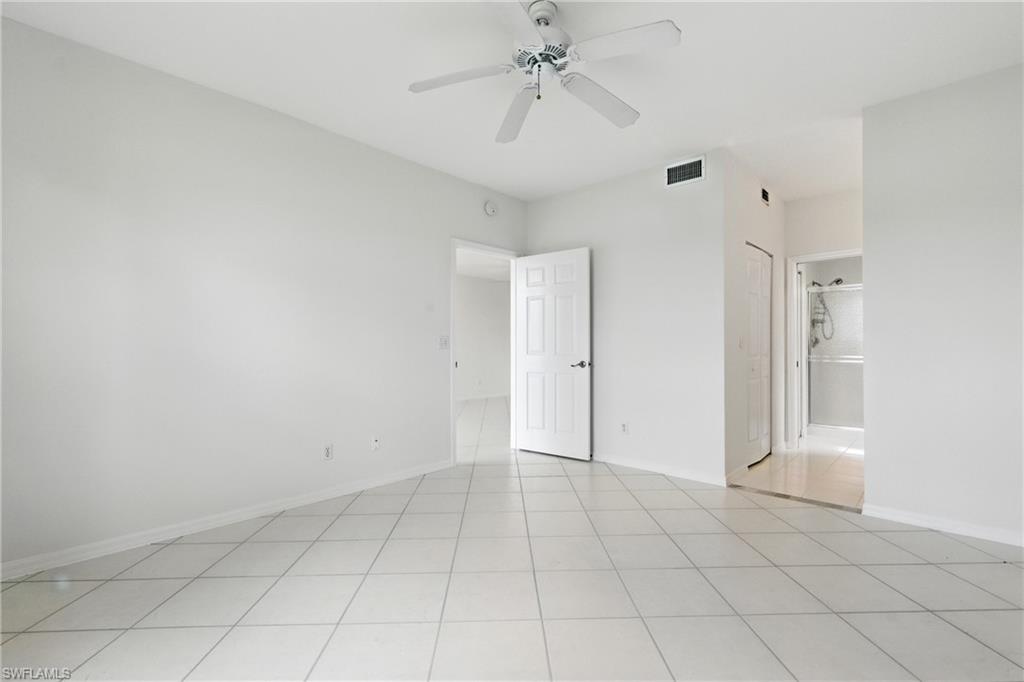 3460 West Crown Pointe Boulevard, Unit 101 Naples, FL 34112 - Photo 20 of 43 a view of an empty room
