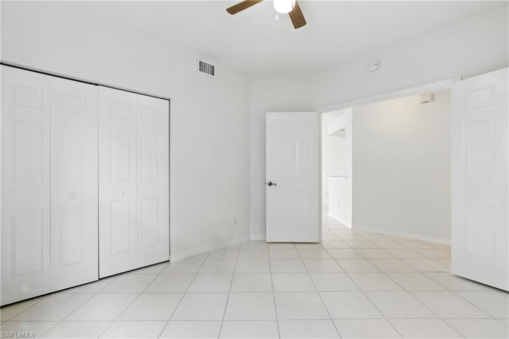 3460 West Crown Pointe Boulevard, Unit 101 Naples, FL 34112 - Photo 28 of 43 a view of an empty room