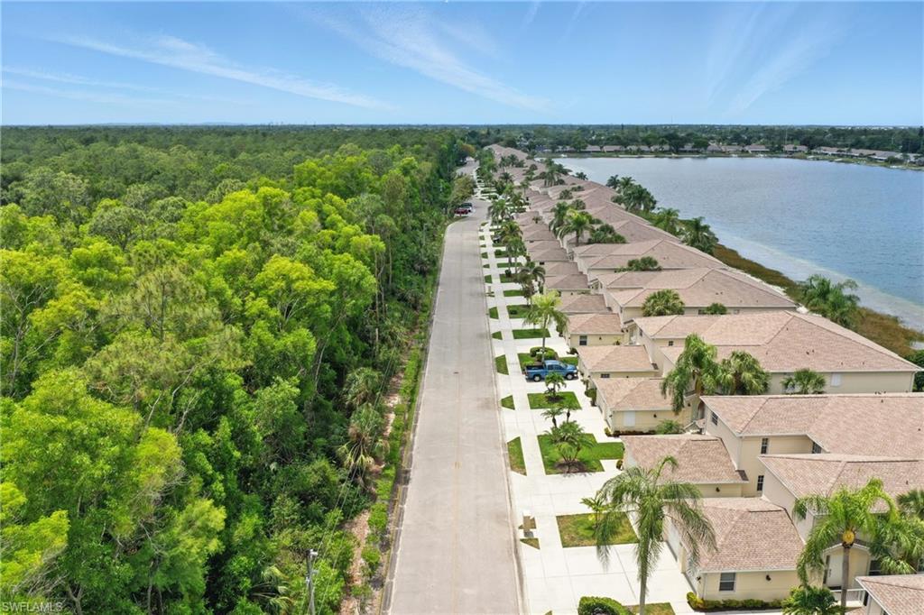3460 West Crown Pointe Boulevard, Unit 101 Naples, FL 34112 - Photo 38 of 43 a view of a lake with outdoor space