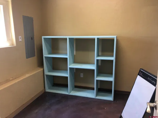 a room with closet and window