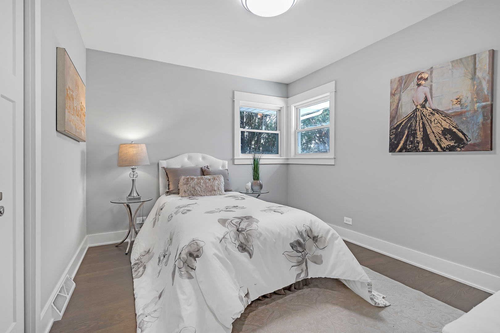 1814 Oakton Street Park Ridge, IL 60068 - Photo 15 of 30 a bedroom with a bed and painting on the wall